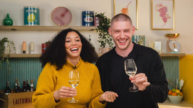 Tyler Butt and Aleesha Hansel laughing at the Channel 4 Served studio. 