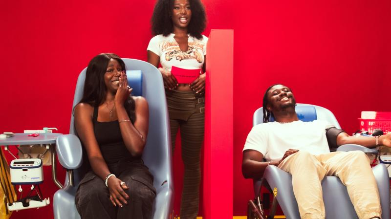It shows Adeola quizzing two people on a date whilst they get their blood taken. They are separated by a divide however. This is from new Channel 4.0 branded entertainment series, Love is in the Blood.