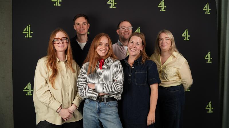 It shows six people smiling at the camera - Holly Fallows, Associate Creative Director BBH, James Rice, Client MD BBH, Arabella Saunders, Strategy Director BBH, Tom Chard, Lead Media and Campaign Planning Manager Tesco, Alicia Southgate, Head of Marketing Tesco and Charlotte Watmough, Associate Creative Director BBH.