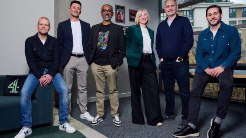 It shows 6 people standing in a room. David Amodio as Head of Sales and Jay Kassam as Head of Business Operations & Revenue Innovation, Rak Patel, Chief Commercial Officer, Sam Hicks, Head of Advertiser Strategy; Ed Chalmers, Head of Trading; and, Barry John, Head of Advertising Operations