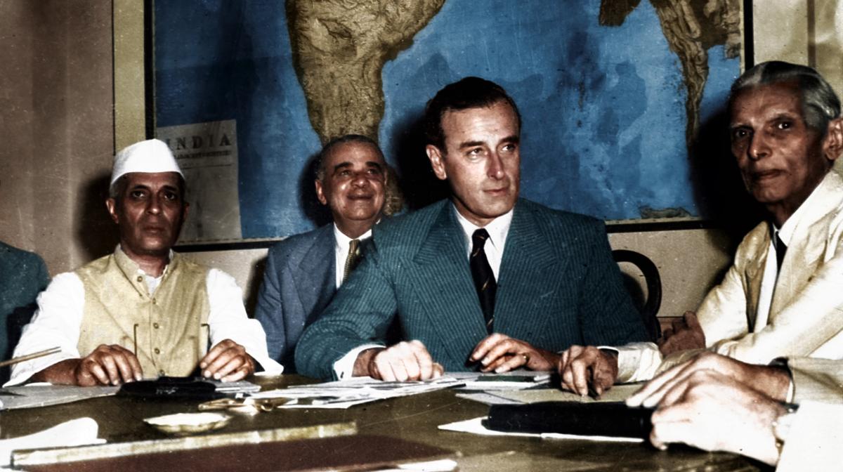 Jawaharlal Nehru (furthest left), Lord Mountbatten (centre), Muhammad Ali Jinnah (right) discuss partition in 1947