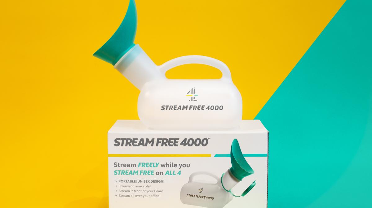 An image of the 'Stream Free 4000' portable unisex urinal on top of a box, which reads 'Stream Free 4000, Stream Free while you stream freely on All 4. Portable unisex design! Stream on your sofa! Stream in front of your Gran! Stream all over your office!' 