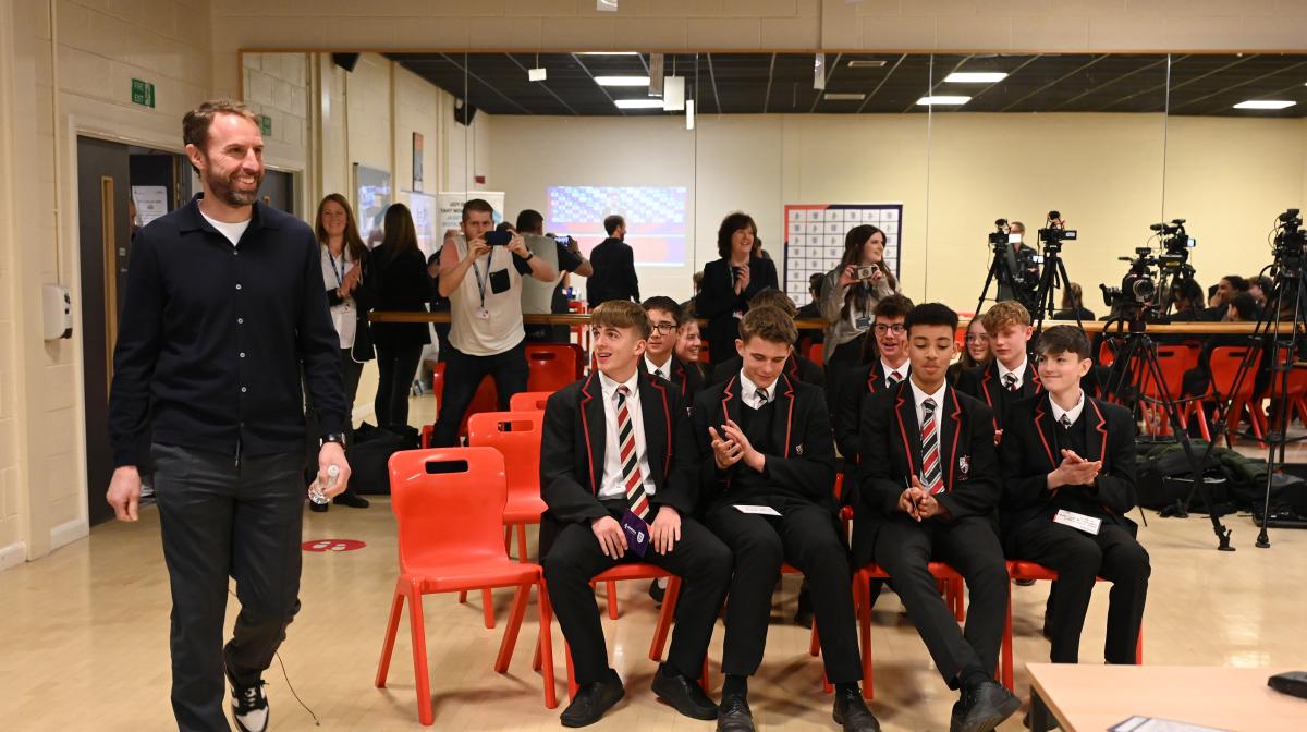 Gareth Southgate enters mock press conference at Leeds school