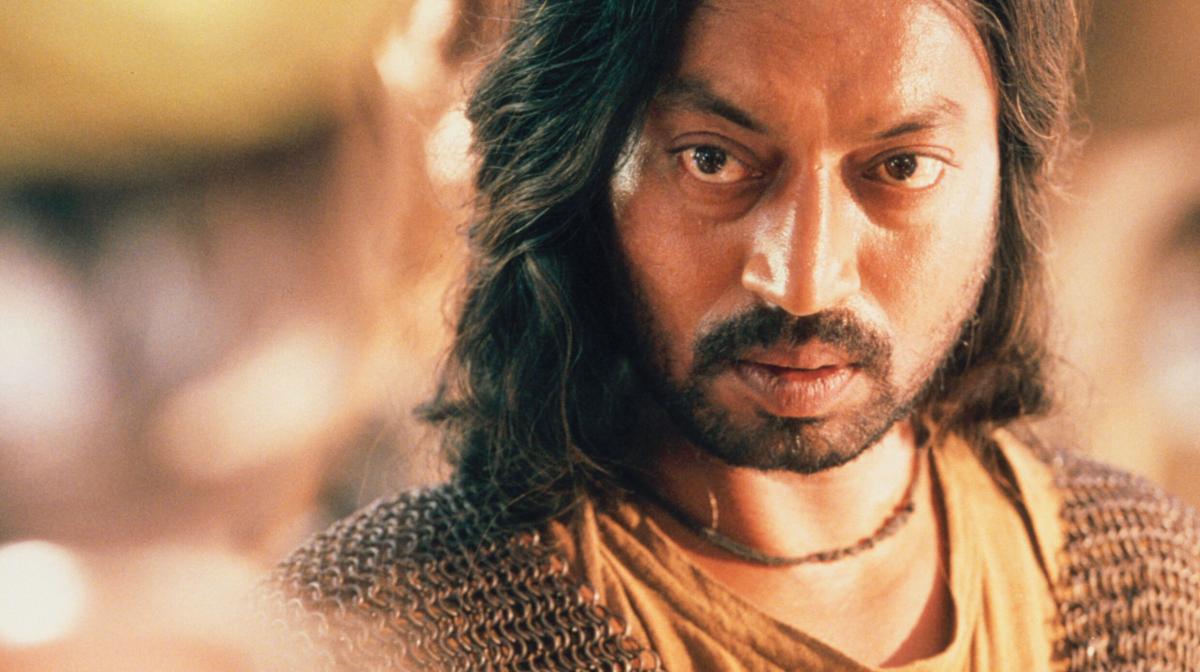 It is a picture from The Warrior and shows a close up of a man's face, staring at the camera.