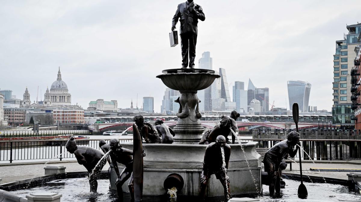 4Creative's Fountain of Filth at Observation Point. Within the fountain, bronze-like statues of men, women, and children appear to vomit murky brown water, a sickening reflection of the real experiences of those who believe they were made ill by exposure to waterways polluted with untreated sewage. London's skyline can be seen in the background.