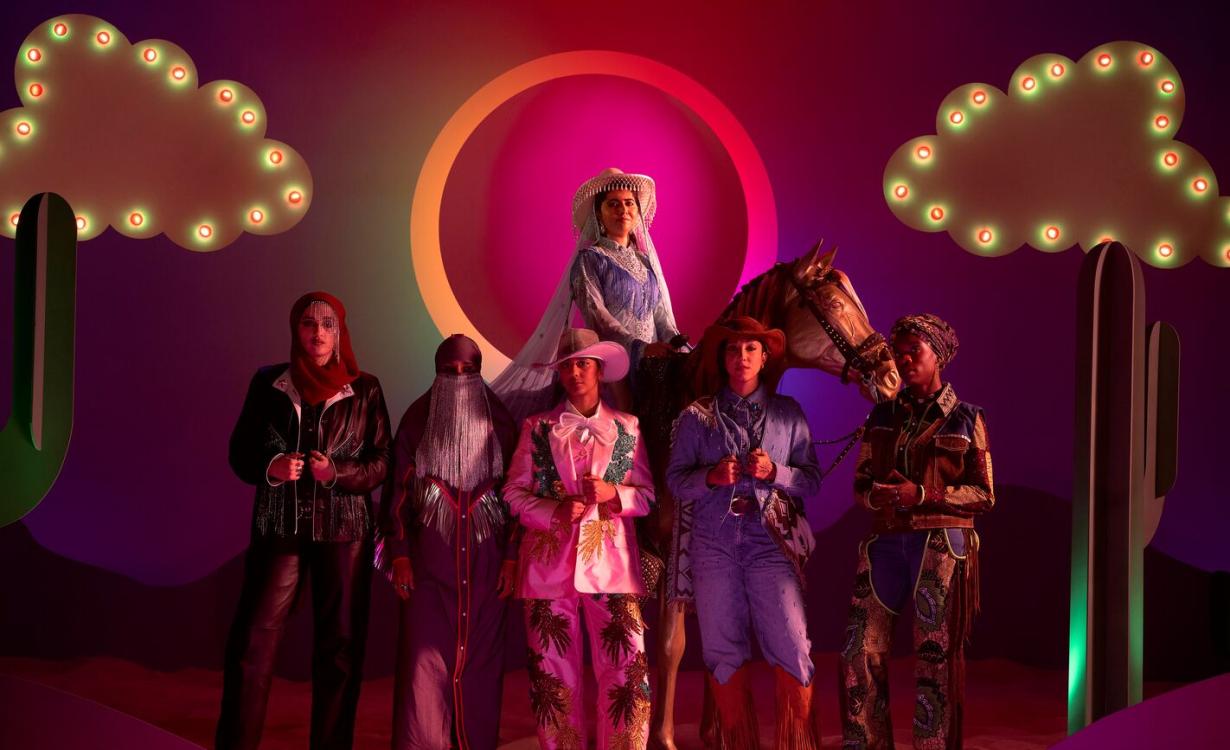 Band members of Lady Parts with Malala on a horse