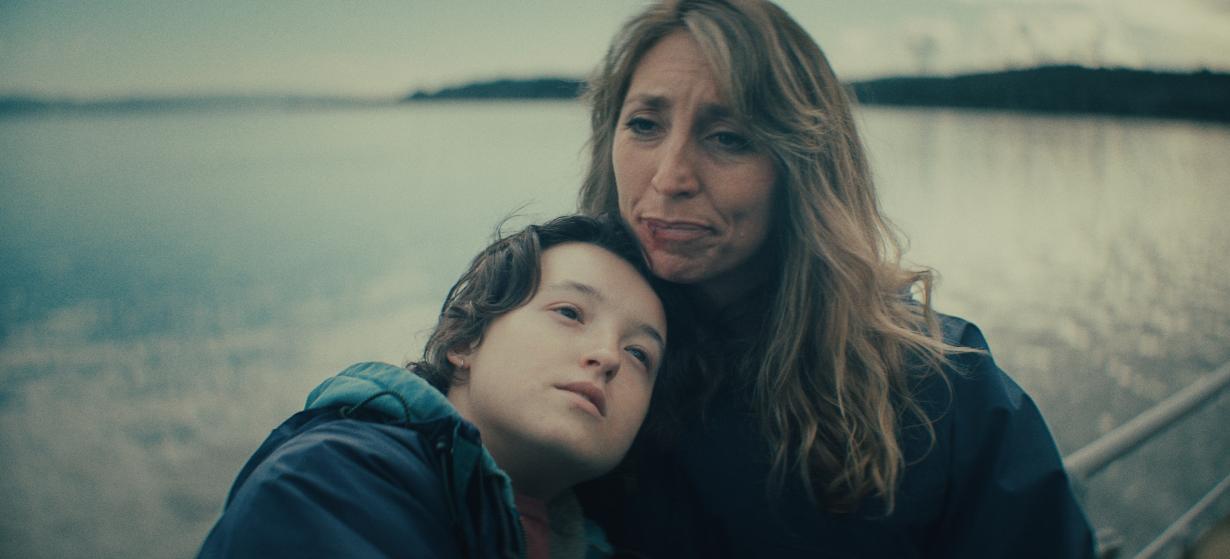 Daisy Haggard and Bella Ramsey embracing