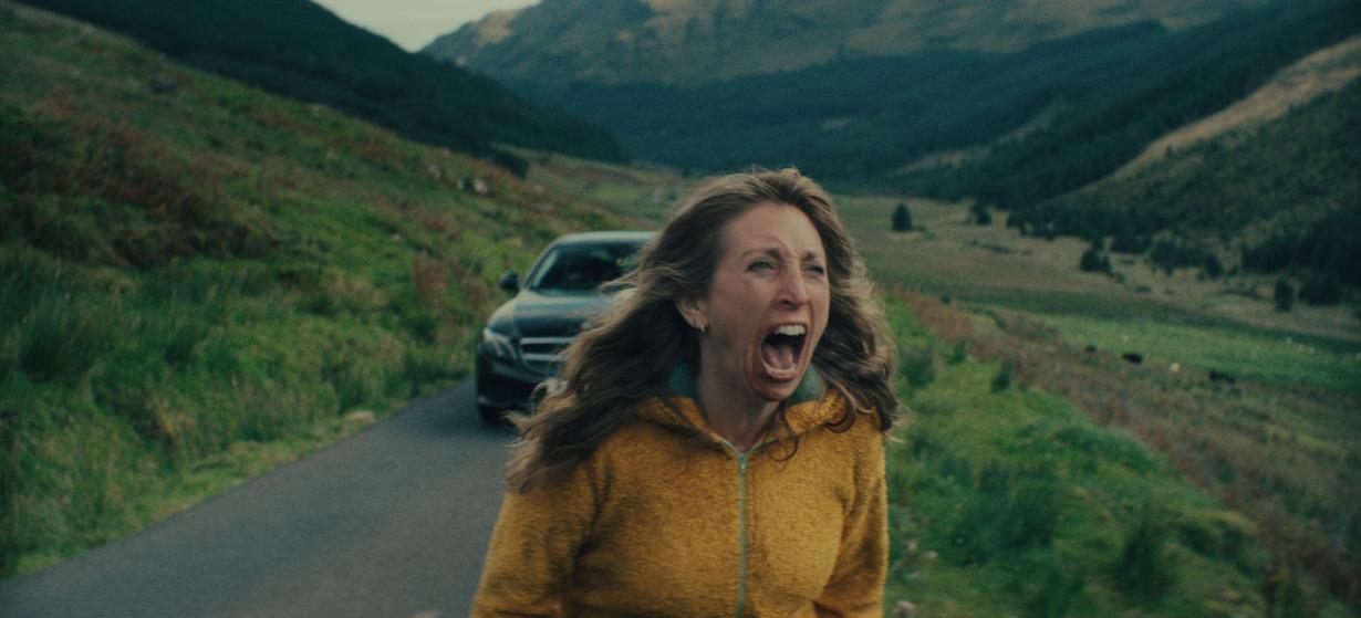 Daisy Haggard screaming in the road